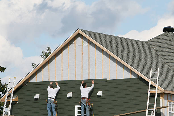 Professional Siding Contractor technician working in Saint Charles, IL